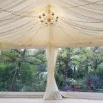 Ivory chandalier and fairy lights